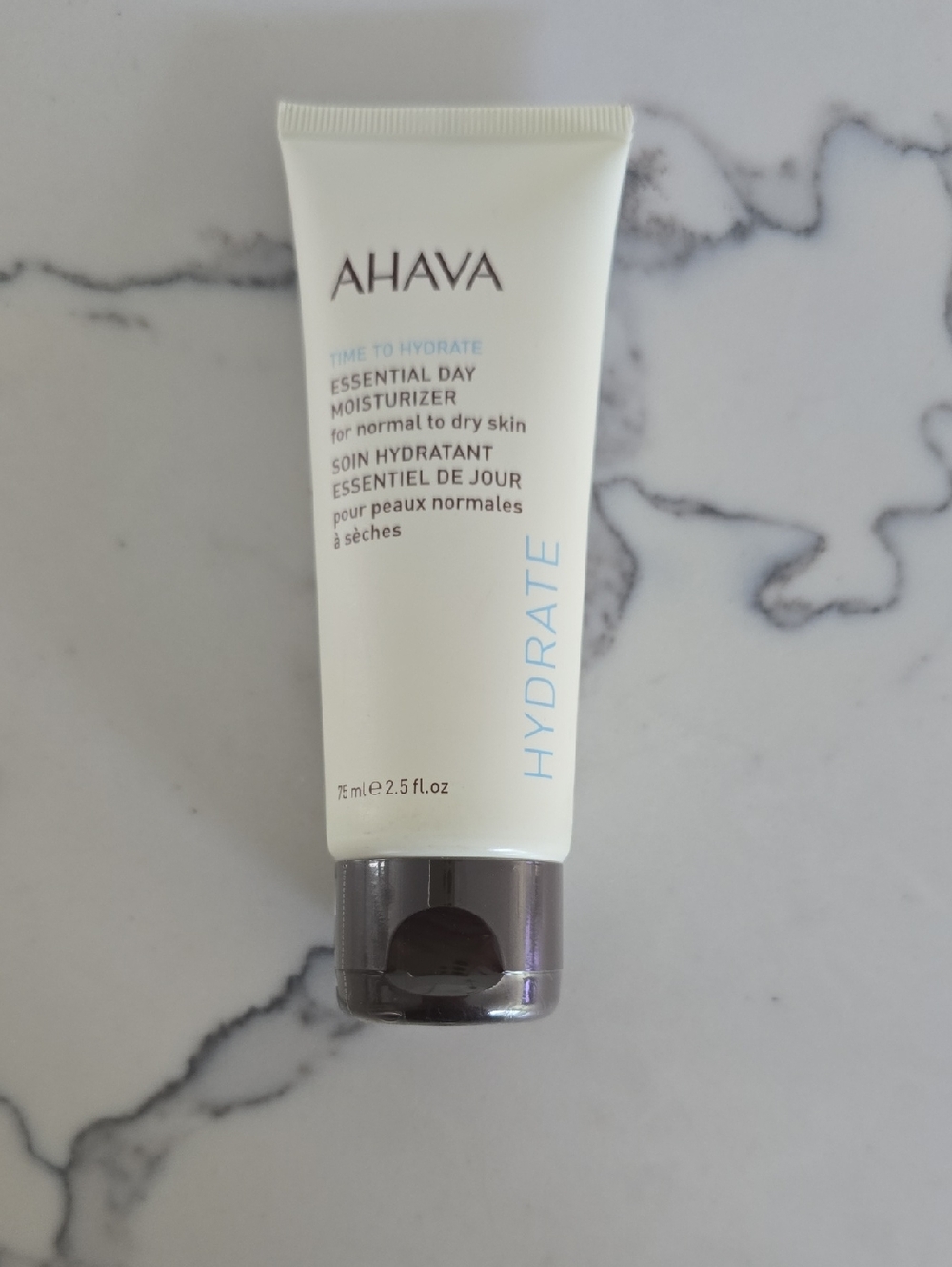 AHAVA Hydrate Essential Day Moisturizer - White with Silver Cap